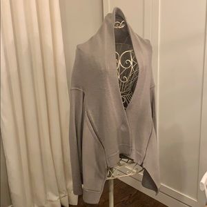 Women’s asymmetrical snap front sweater